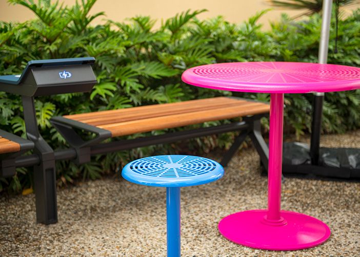 Aria Benches, PowerMe, Cafe Table in Telemagenta and Cafe Stool in Bondi Blue.