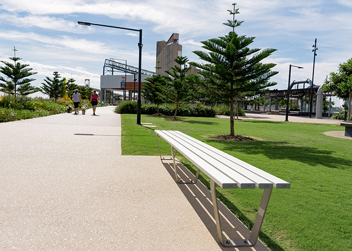 Custom Bench designed by Urbis, with anodised aluminium battens and stainless steel frame.
