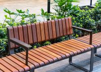 Tailored Linea VT seat with Spotted Gum hardwood battens, Textura Dark Bronze frame.