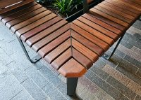 Tailored Linea VT bench with Spotted Gum hardwood battens, Textura Dark Bronze frame.