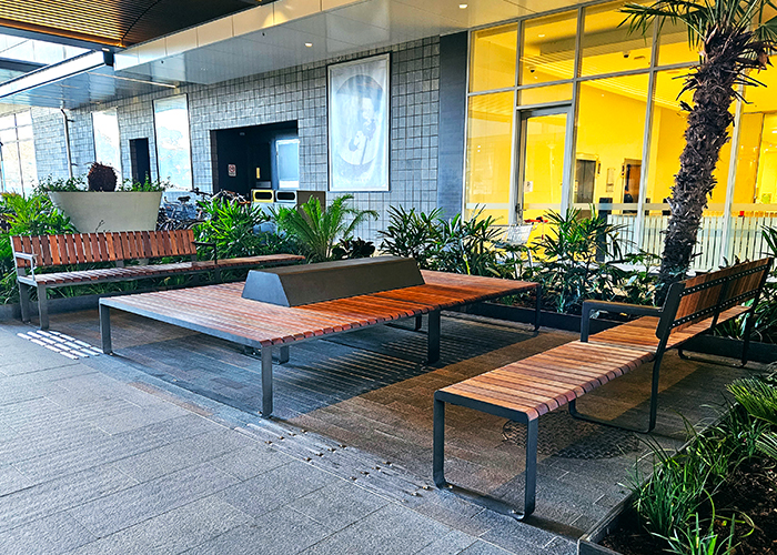 Tailored Linea Platform with Hill, Spotted Gum hardwood battens, Textura Dark Bronze frame.