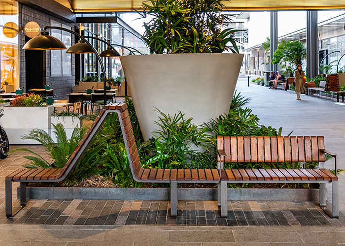 Tailored Linea VT seating system with Spotted Gum hardwood battens, Textura Dark Bronze frame.