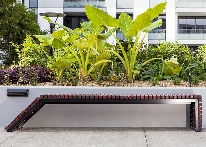 Bespoke furniture by Urbis adds contemporary flair to the high-end development.