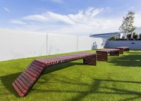 Bespoke furniture adorns the rooftop park.