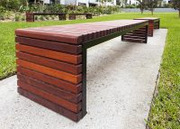 Jarrah battens and frames powdercoated in Night Sky Satin create a contemporary look.