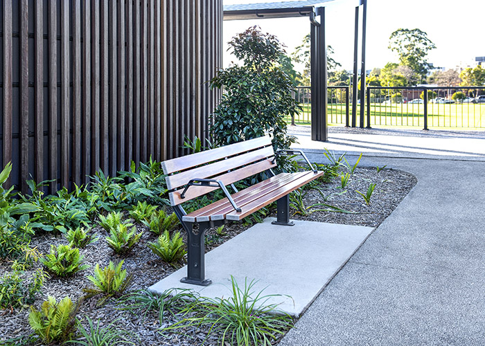 Park DDA Seat, battens in aluminium woodgrain Spotted Gum, frames in Monument.