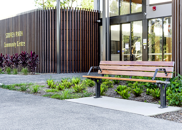 Park DDA Seat, battens in aluminium woodgrain Spotted Gum, frames in Monument.