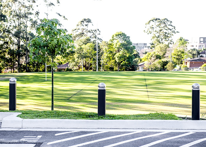 Wide Bollards, dome head with single collar, subsurface fixed and removable, with bodies in Monument.