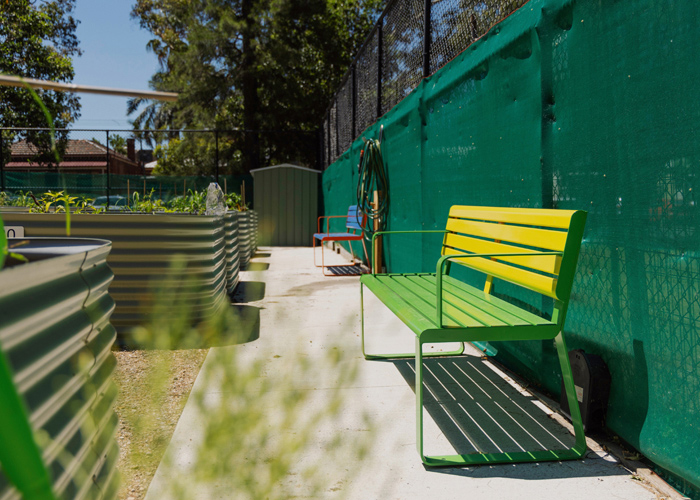 Linea Seat (LIS10 1800mm), freestanding in Viper Green frame and seat battens, with Brilliant Yellow backrest battens