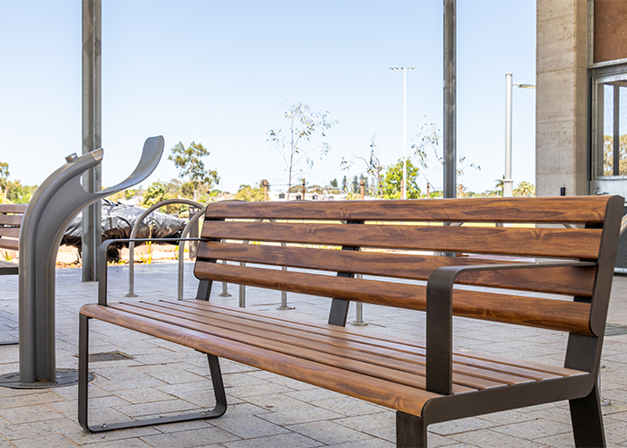 Linea Seat (LIS10, 1800mm) with aluminium woodgrain Spotted Gum battens, Textura Dark Bronze frame.
