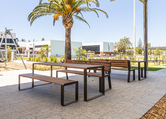 Linea Table (LIT10, 2100mm with LIS10 and LIB6, 1800mm) in aluminium Spotted Gum, Textura Dark Bronze.