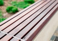 Linea Bench (LIB6, 1800mm) plinth-fixed with hardwood battens, Jasper frames.