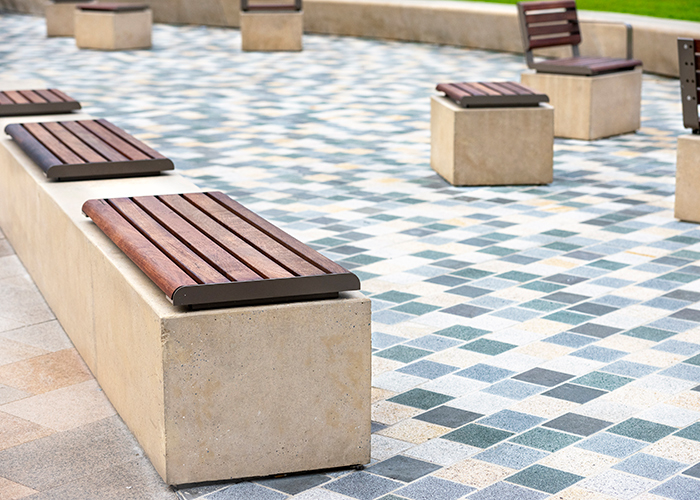 Linea Seats and Benches (600mm, 1200mm) plinth-fixed with hardwood battens, Jasper frames.