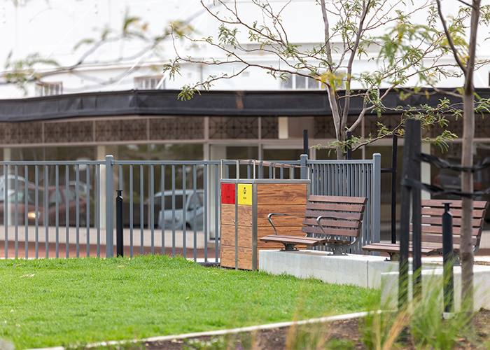 Frame Bin Enclosure with custom battened body in aluminium woodgrain in Spotted Gum.