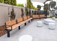 Aria Seating System (2S-2S-2S-2S-C45-3S-3S), aluminium Spotted Gum battens, Textura Night Sky frame.