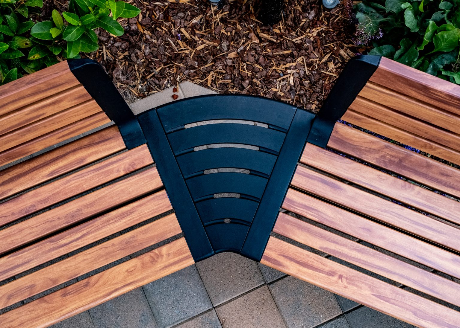 Aria Seating System (CMA), aluminium woodgrain battens in Spotted Gum, Textura Night Sky frame.