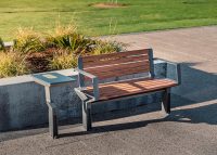 Aria Seat (CMA1) and PowerMe Table (PM). Woodgrain battens, Deep Ocean tabletop, Sable Brilliance frame.