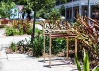 Linea Bicycle Stand (BST07) with aluminium Bush Cherry insert, Textura Doe Skin frame.