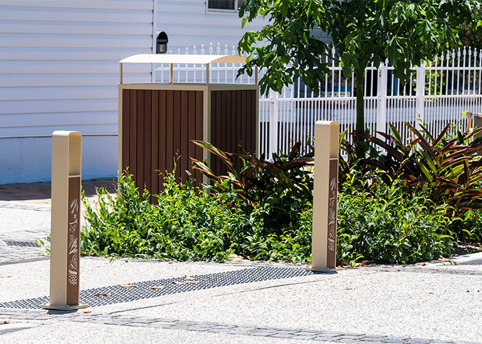 Linea Bollard (B6) with etched artwork, aluminium Bush Cherry insert, Textura Doe Skin frame.