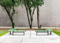 Aria Seating System (CMA4-2B-C90-3B-C90-2B) with Pedestal leg, Shamrock and Viper Green battens, Woodland Grey frames.