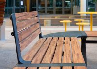 Aria Seating System, woodgrain aluminium battens in Spotted Gum, Textura Monument frames.