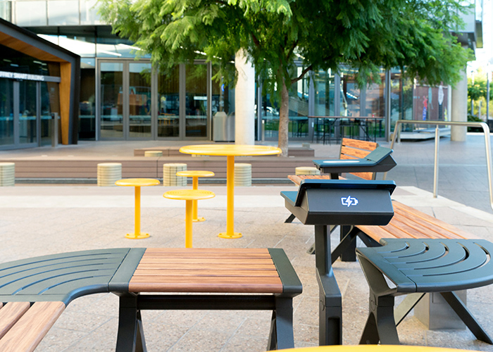 Aria Seating System, woodgrain aluminium battens in Spotted Gum, Textura Monument frames.