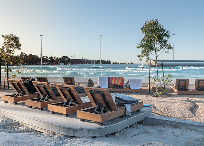 Custom double and single sun loungers, and side tables, for URBNSURF Melbourne.