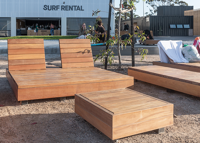 Custom double and single sun loungers, and side tables, for URBNSURF Melbourne.