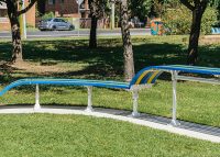 Tailored Mall Curved Slim Bench in Bondi Blue, Jaybird Blue and Brilliant Yellow with Pearl White frame.