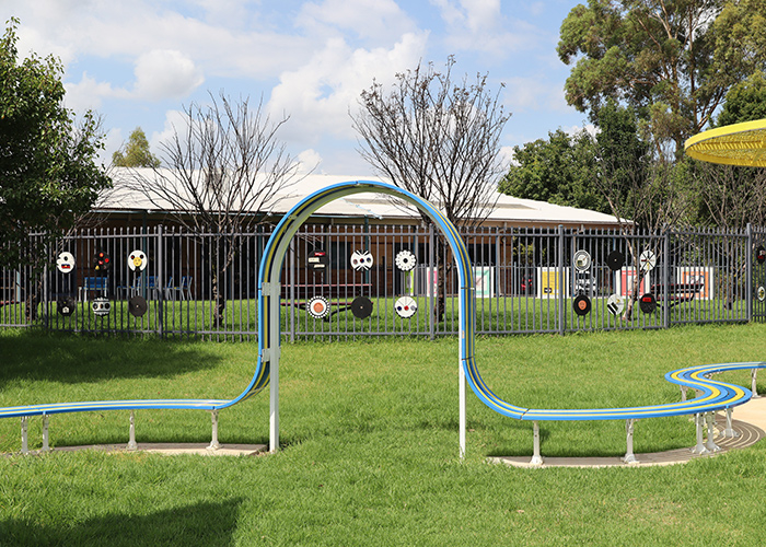Tailored Mall Curved Slim Bench in Bondi Blue, Jaybird Blue and Brilliant Yellow with Pearl White frame.