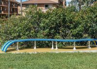 Tailored Mall Curved Slim Bench in Bondi Blue, Jaybird Blue and Brilliant Yellow with Pearl White frame.