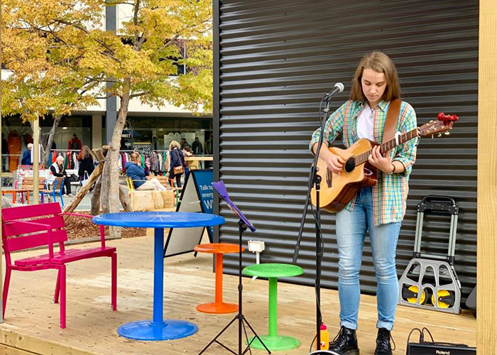 Forum Seat with Cafe Round Table and Stools in Telemagenta, Bondi Blue, Sensation Orange, Shamrock.