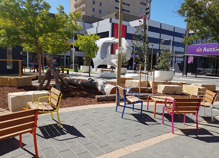 Places for children to play, and adults to watch and socialise in comfort.