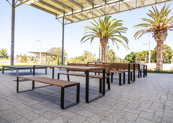 Linea Table (LIT10, 2100mm with LIS10 and LIB6, 1800mm) in aluminium Spotted Gum, Textura Dark Bronze.