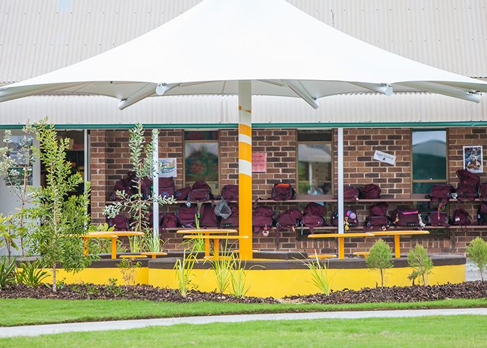 Cafe Round Tables and Stools powder coated in Safety Yellow.