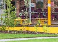 Cafe Round Tables and Stools powder coated in Safety Yellow.