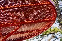 ChillOUT Tree (CT1) flat circular roof in Sensation Orange with Champagne perforated panels.