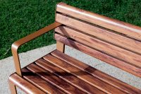 Linea Seat, 1800mm, with arms, aluminium woodgrain Spotted Gum battens, Textura Russet frames.