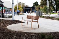 Linea Seat, 1800mm, with arms, aluminium woodgrain Spotted Gum battens, Textura Russet frames.