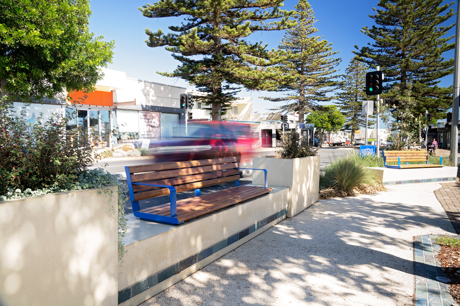 Linea Seat plinth-fixed with aluminium Spotted Gum battens, Jaybird Blue frames.