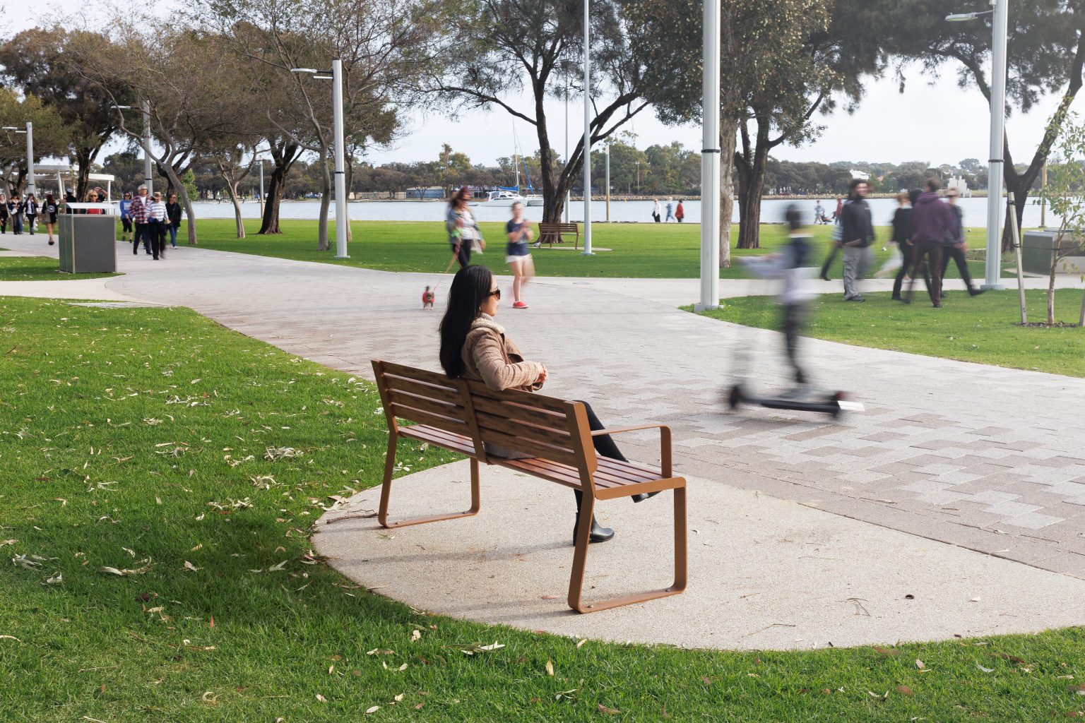 Linea Seat, 1800mm, with arms, aluminium woodgrain Spotted Gum battens, Textura Russet frames.