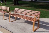 Linea Seat, 1800mm, with arms, aluminium woodgrain Spotted Gum battens, Textura Russet frames.