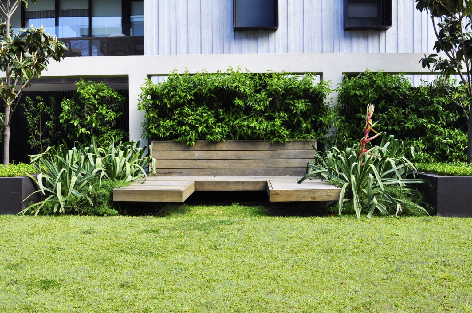 Custom day beds on the lawn at Warleigh Grove, Brighton.